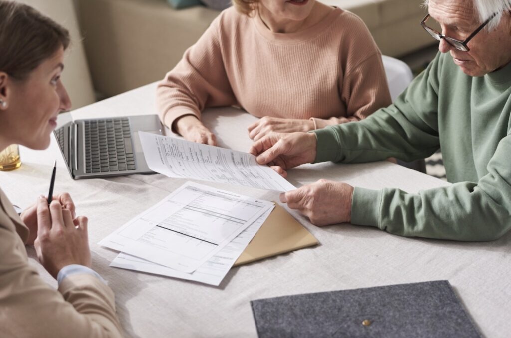 Older couple filing a breach of fiduciary duty lawsuit.